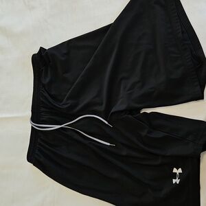 Under Armour athletic shorts.  Medium